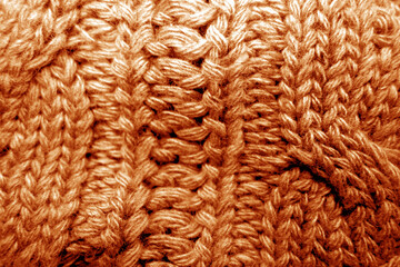Warm knitting texture in orange tone.