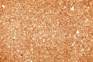 Cork board texture in orange tone.