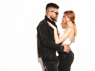 Sexy confident beautiful woman and her handsome boyfriend. Happy cheerful family having tender moments.Young passionate couple hugging before having sex. Sensual pair getting closer for kiss. Isolated