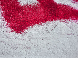 Texture of pink paint on a white wall, graffiti, street art. Traces and brush