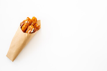 Fast food sweets - churros in paper bag