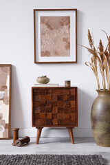 Modern composition of creative living room interior with elegant cupboard, mock up painting and...