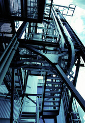 Equipment, cables and piping as found inside of  industrial power plant
