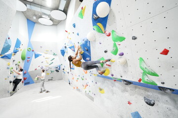 Young girl bouldering