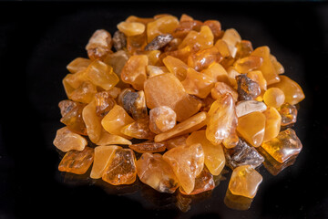 A pieces of beautiful amber on a black background