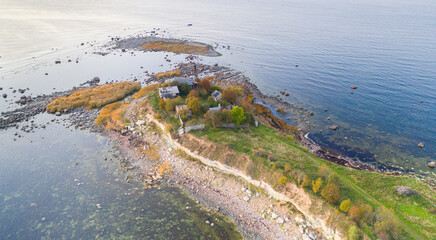Aerial view to the thin cape badly suffering by coastal erosion and with the abandoned historic...