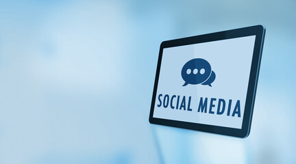 Speech Bubble Symbol and Social Media Text On A Digital Tablet Screen