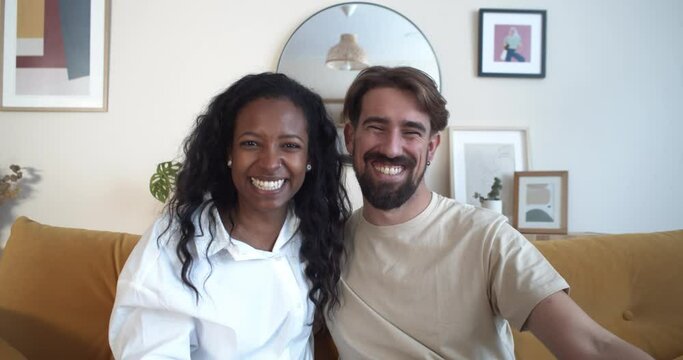 POV of a young multi-ethnic couple influencers  making a video call or recording a vlog 