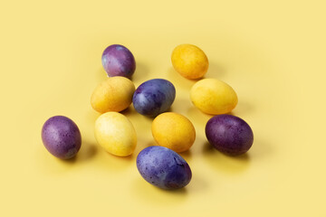Easter eggs on a yellow background. Concept. Painted colorful eggs. Photo