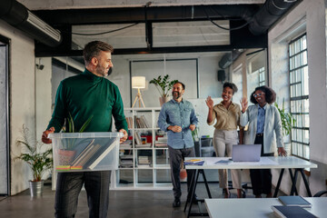 Multiracial colleagues welcomed man who return to work