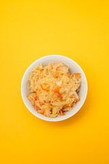 salted cabbage with carrot in white bowl