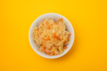 salted cabbage with carrot in white bowl