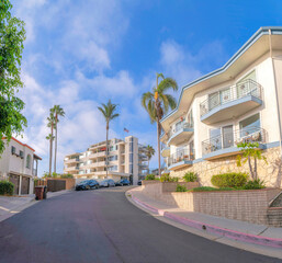Fototapeta na wymiar Curve road in the middle of residential buildings at San Clemente, California