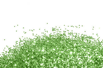 Green glitter sparkles on white background. Can be used as place for text, for greeting or invitation cards, fashion magazines, web sites etc.