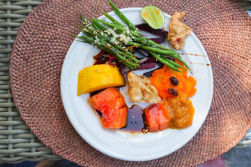 Indonesia, Bali, Ubud; rich breakfast of fruits and vegetables