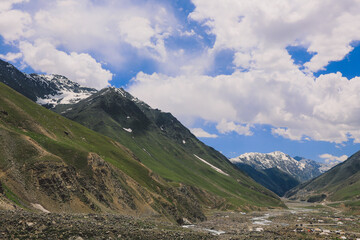 Fototapeta premium Amazing View to the Snow Capped Mountain Peaks in the Gilgit Baltistan Highlands under the Blue Sky, Pakistan