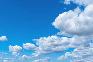 Naklejka na ściany i meble Cloudy blue and beautiful bright sky background