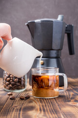 Making coffee with cream.