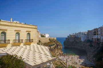 Naklejka premium Polignano a Mare, historic city in Apulia. Buildings on the coast