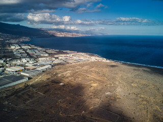 Aerial views of industrial park located next to the coast of the island of Tenerife.