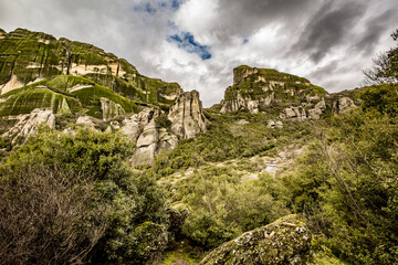 Cloudy perspective of the mighty beautiful cliffs at Meteora, Greece