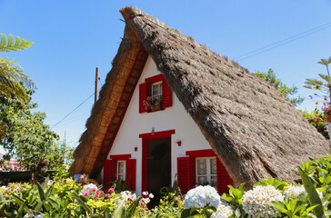 Fototapeta na wymiar Traditional A-frame house in Santana, Northern Madeira, Portugal..
