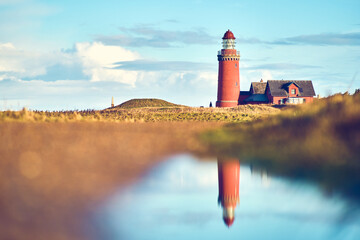 Lighthouse at north sea coast in denmark. High quality photo - obrazy, fototapety, plakaty