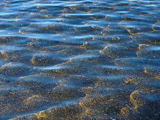 golden glow on the tafil of water
