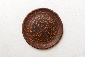 Top view of empty plate on cement background. Empty space for your design