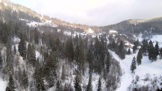 aerial view of sunrise above winter carpathian mountains