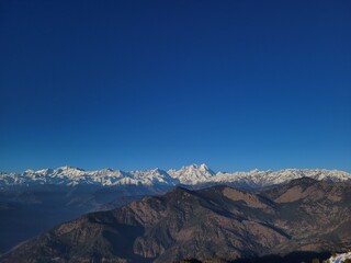 Rudraprayag, India - January 4th 2022: Mount Chaukamba as seen from Kartik swami temple.