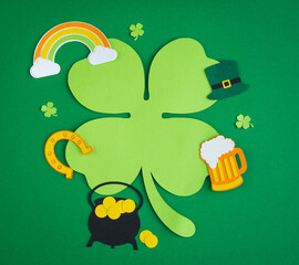 St. Patrick's Day. Banner design with shamrock leaf, beer, hat, pot with coins and rainbow. Copy space.