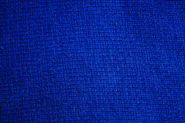 Close the background texture of blue Italian knitted wool.