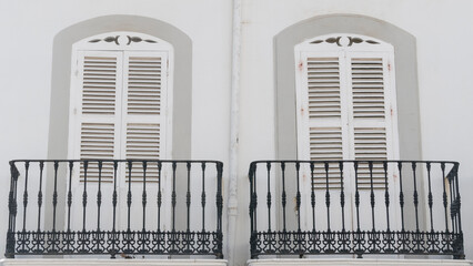 Two wooden doors on the balconies 