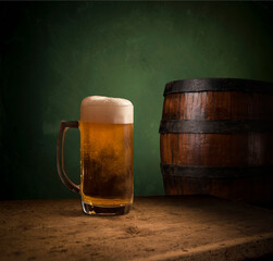 pouring beer with chicken wings in background.