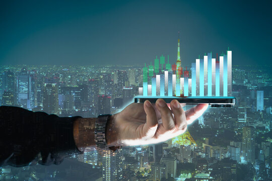 Finance Content marketing concept and Digital marketing with person hand using a smart phone computer on cityscape background..