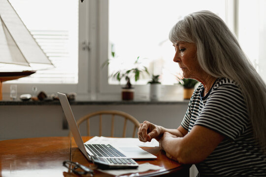 Senior woman using laptop
