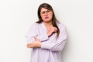 Fototapeta premium Young caucasian overweight woman isolated on white background massaging elbow, suffering after a bad movement.