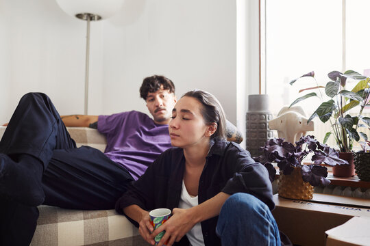 Young couple in living room