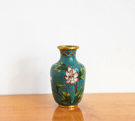 Vintage Chinese enameled copper vase with flower pattern