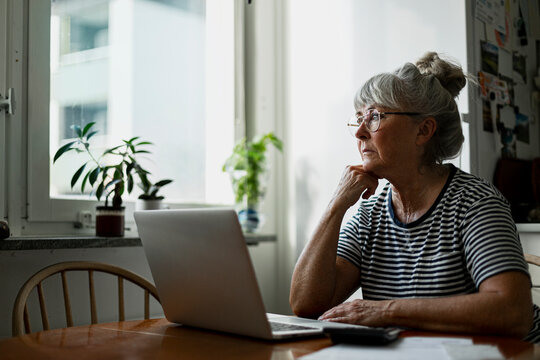 Senior woman using laptop