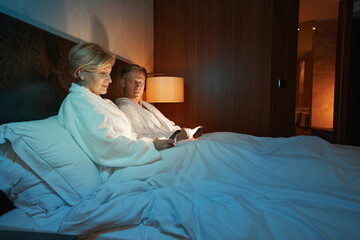 Cute mature couple doing their pre-sleep routine