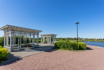 Arbors in the park on the lake