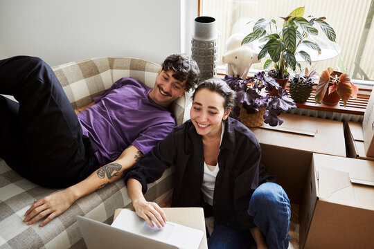 Young couple in living room