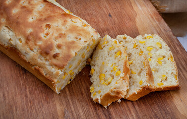 Mielie bread, a South African bread with whole sweetcorn on rustic  kitchen table