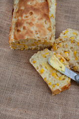 Mielie bread, a South African bread with whole sweetcorn on rustic  kitchen table