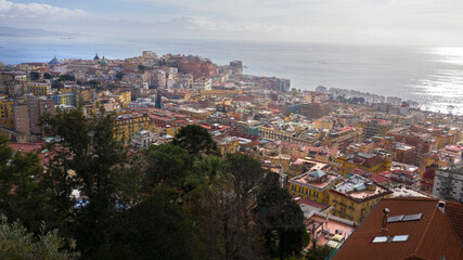 Naklejka premium Aerial view of the city of Naples and the seafront of Mergellina on a sunny day.