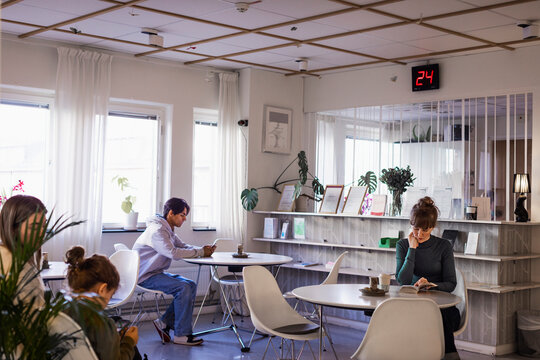 People Sitting In Waiting Room