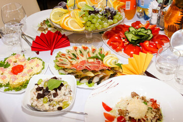 Buffet table for a holiday or corporate event. A large assortment of snacks. Buffet breakfast
