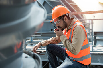 Engineer under checking the industry cooling tower air conditioner is water cooling tower air...
